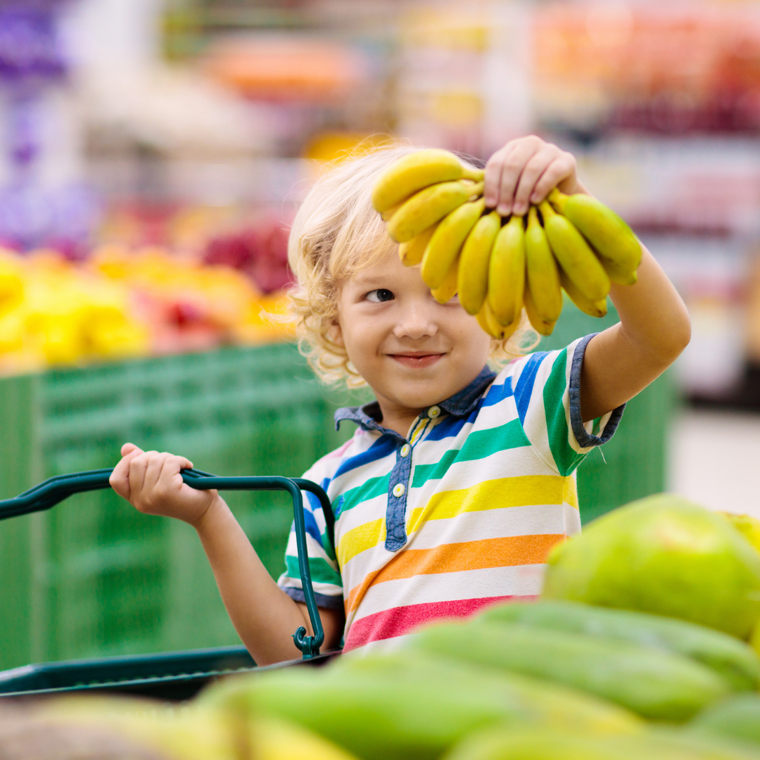50 child holding bananas