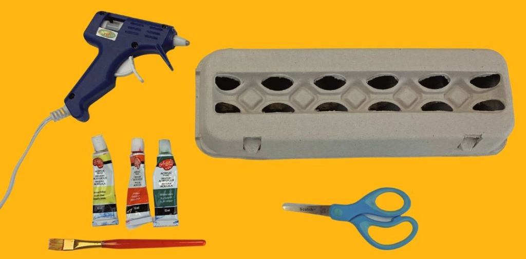 supplies glue gun and egg carton